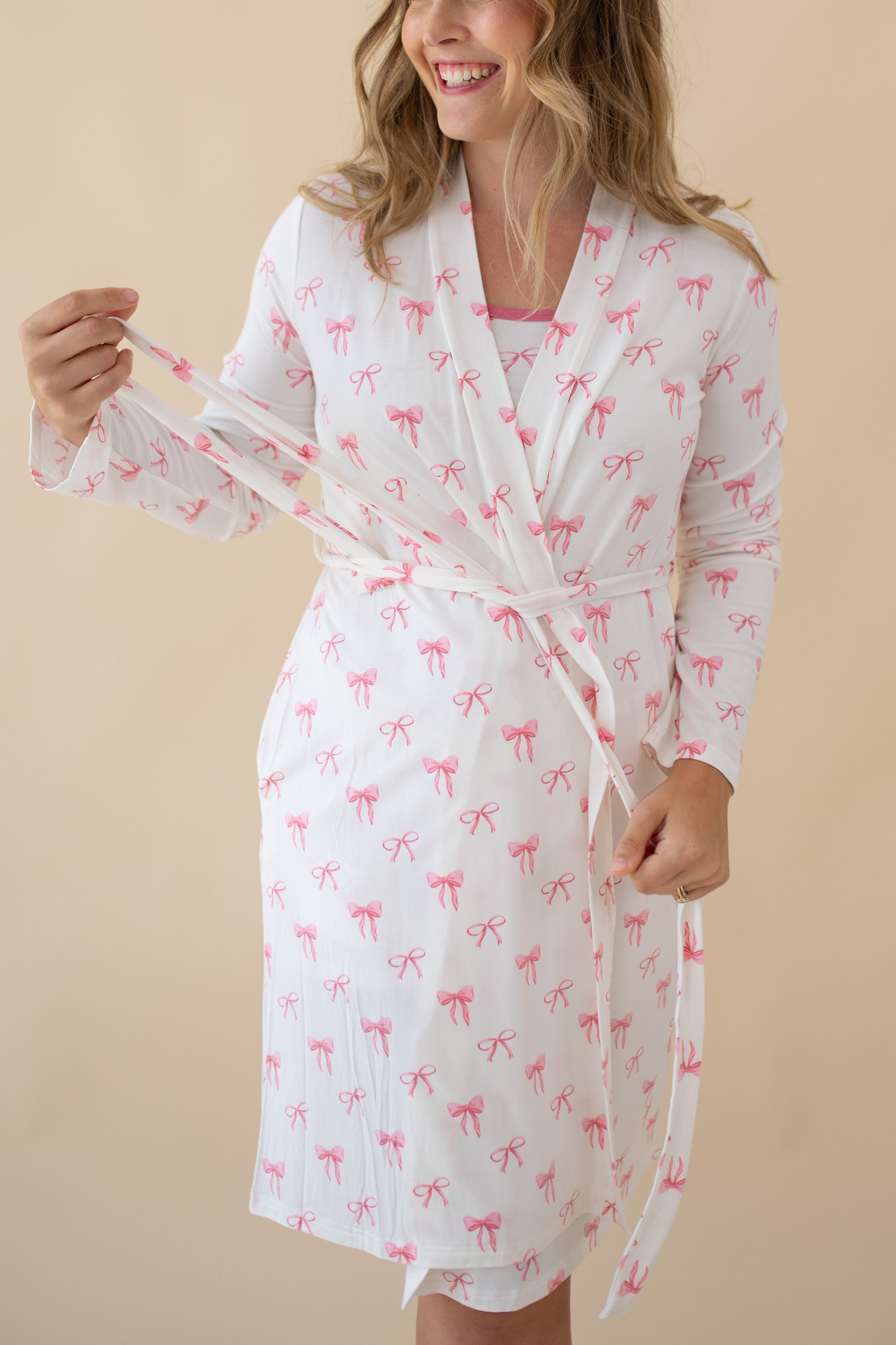 Woman modeling Women’s Lounge Robe in Bow showing the tie function
