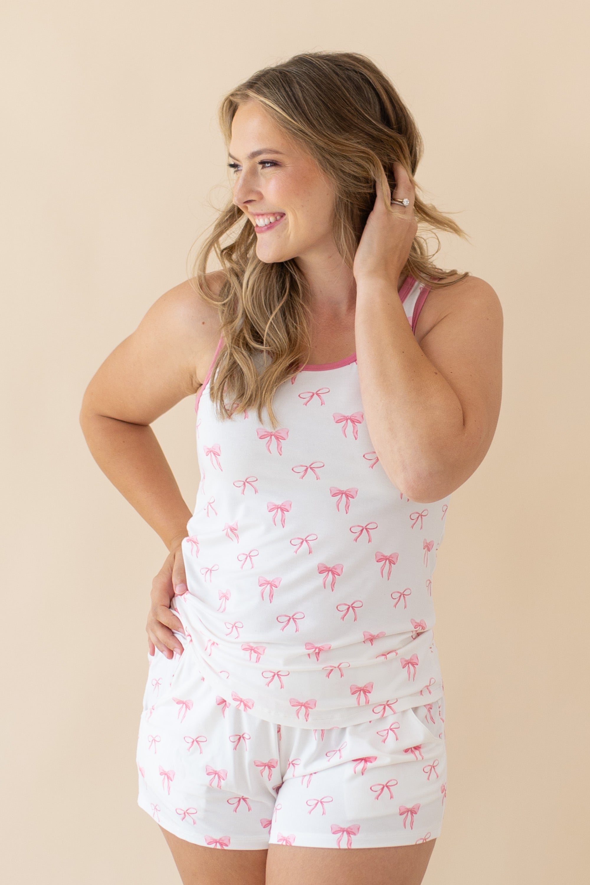 Woman modeling Women’s Tank Set in Bow looking off to side