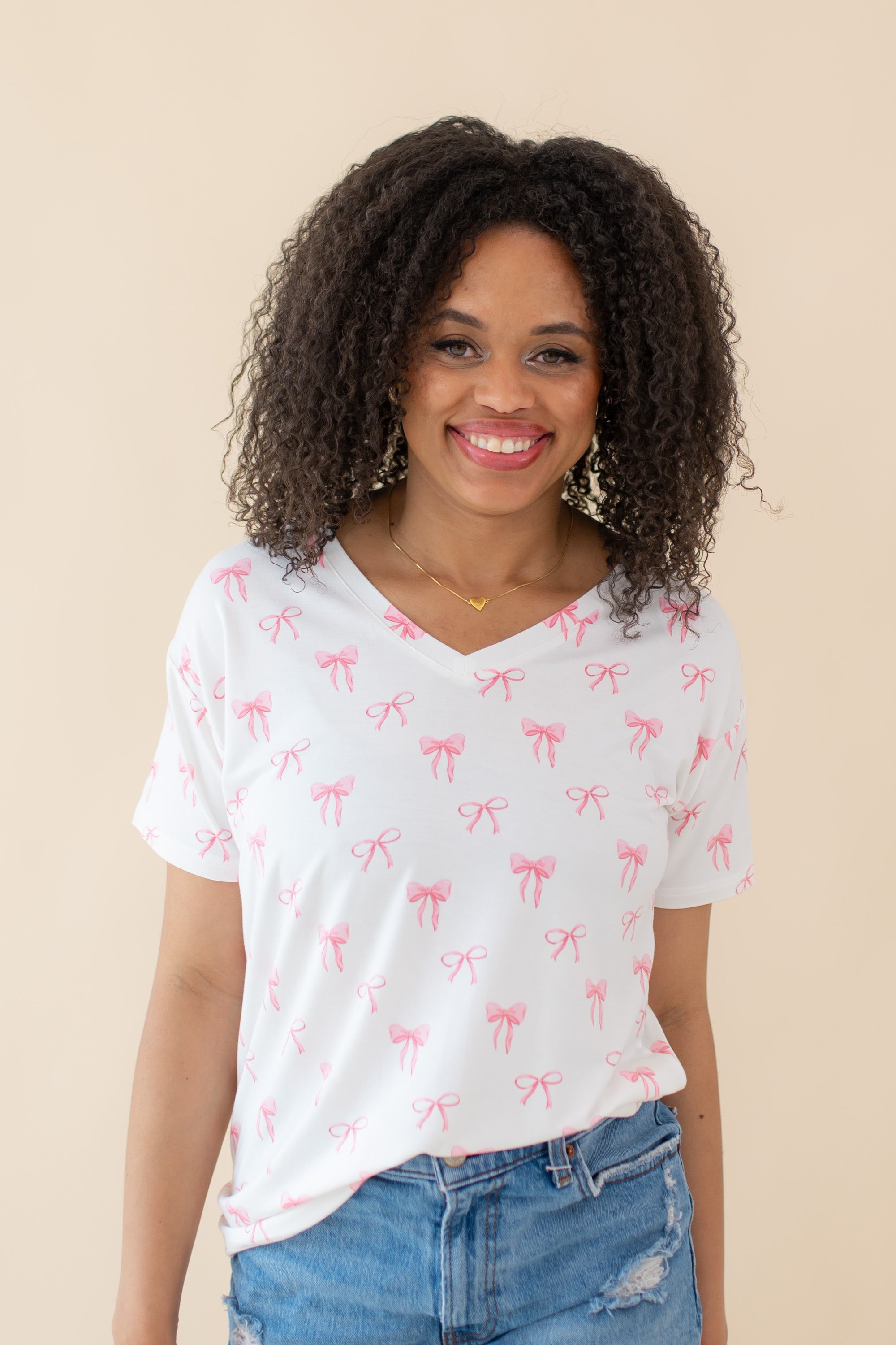 Woman modeling Women’s Relaxed Fit V-Neck in Bow