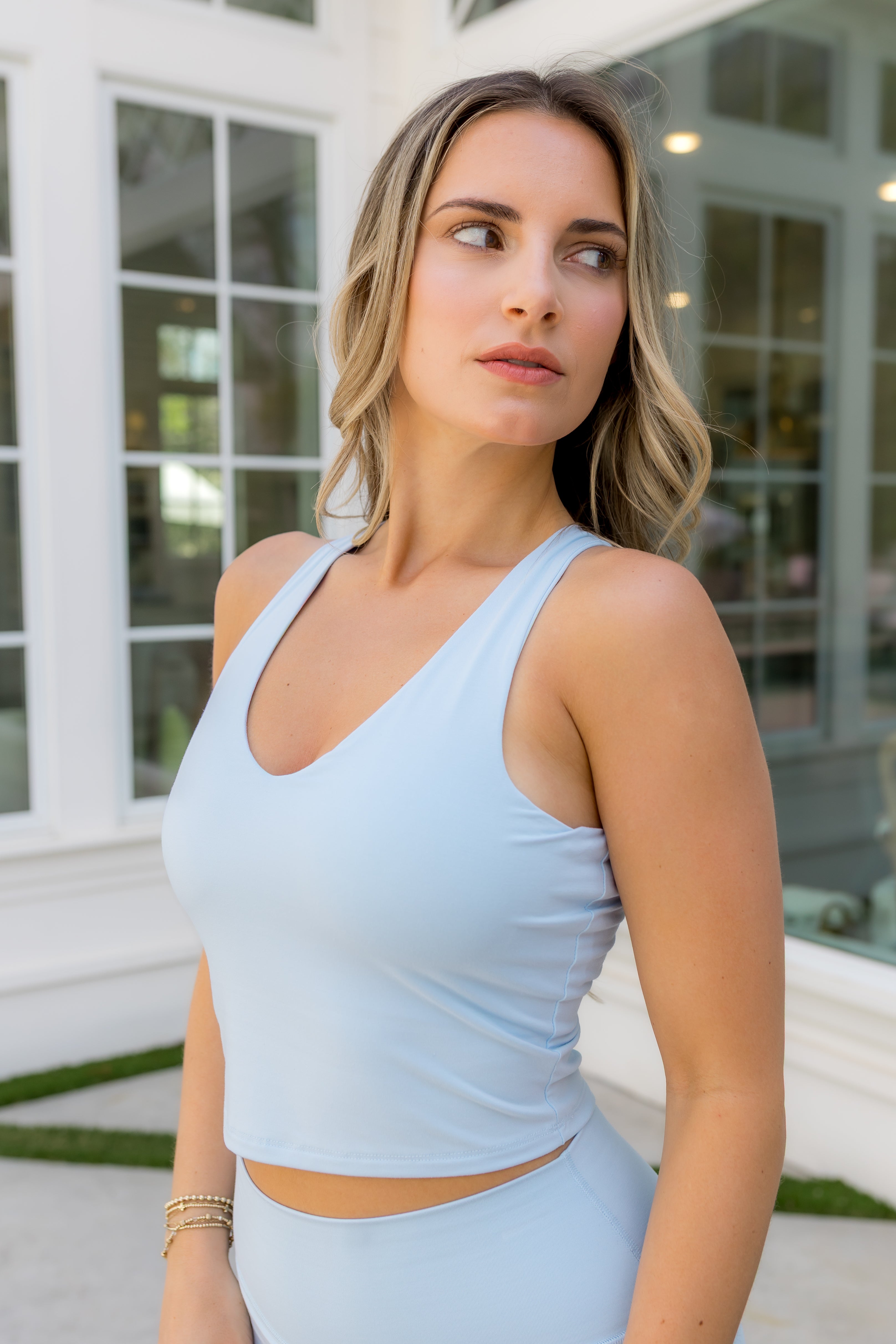 Female modeling the Bamboo Flex Bra Tank in Breeze with matching skort


