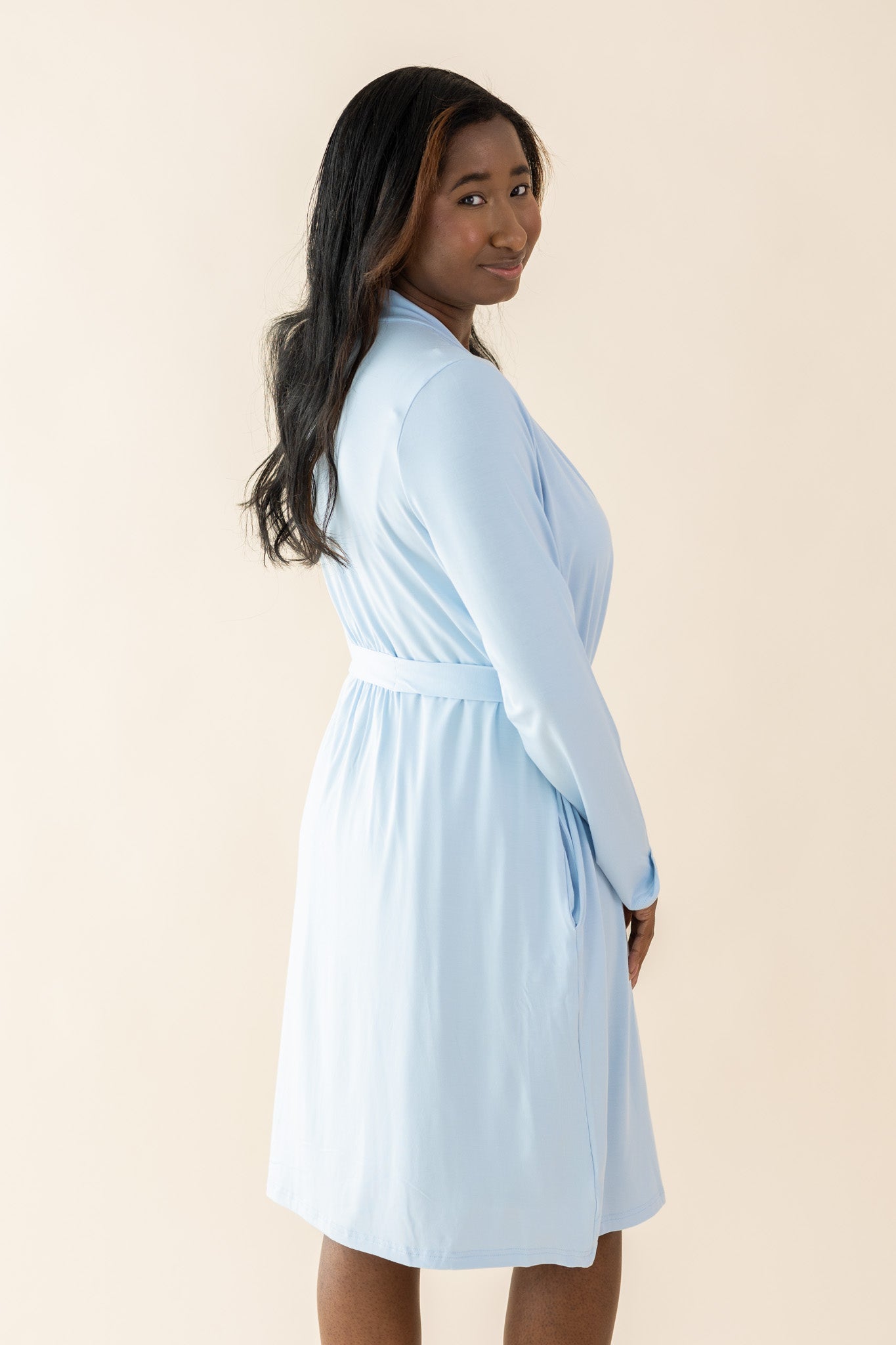 Woman showcasing the back of the Bamboo Women's Lounge Robe in Breeze