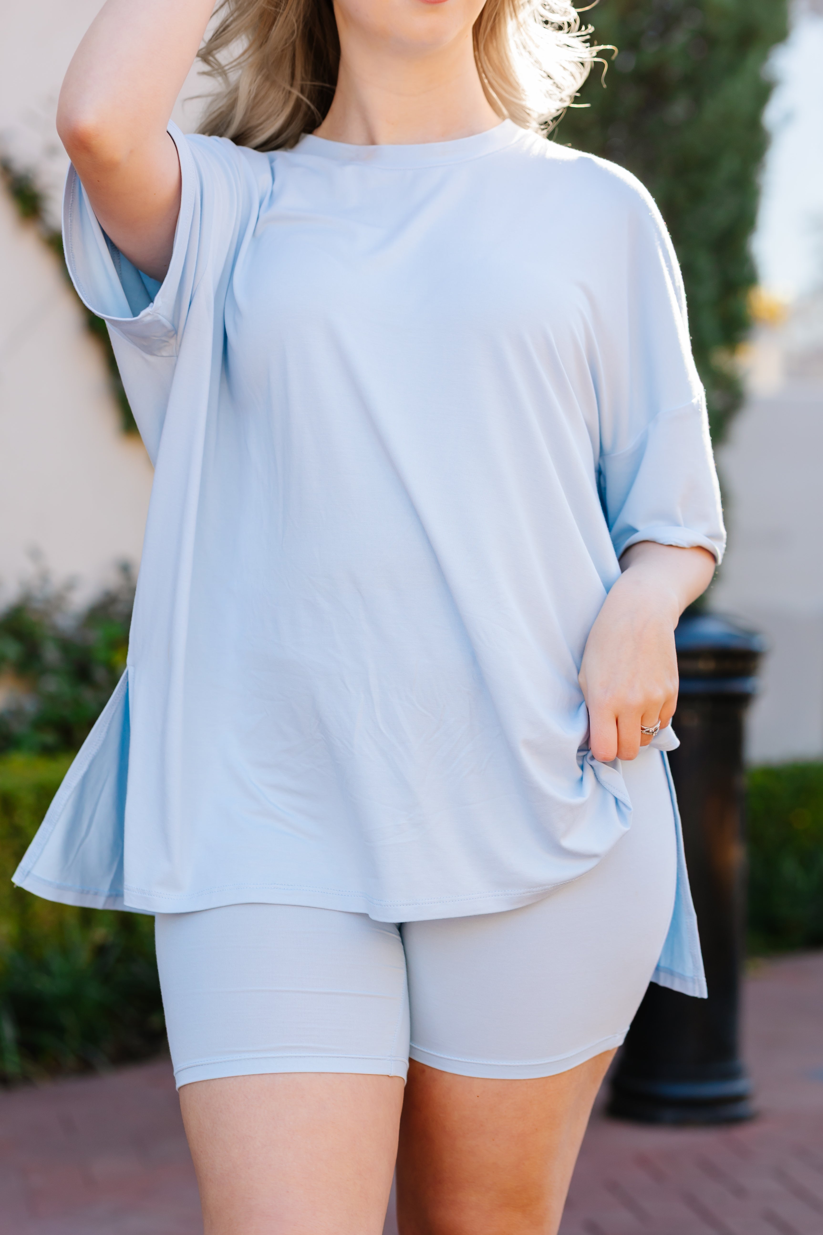 Close up of the model wearing the  Biker Short Set in Breeze 