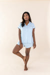Woman standing in a yoga pose while modeling the Bamboo Women's Short Sleeve Pajama Set in Breeze ::: Model is 5'3" wearing size S ///