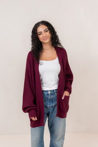 Burgundy chunky knit cardigan, front angled view