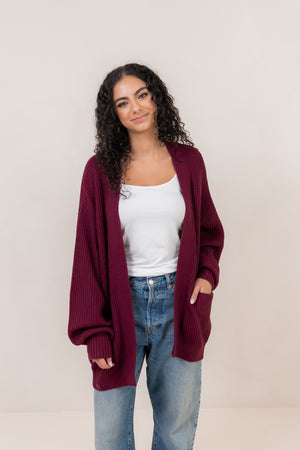Burgundy chunky knit cardigan, front angled view  ::: Model is 5'5" wearing size M ///