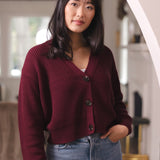 Woman with her hand in her jean pocket wearing cropped cardigan in burgundy
::: Model is 5'9" wearing size S ///