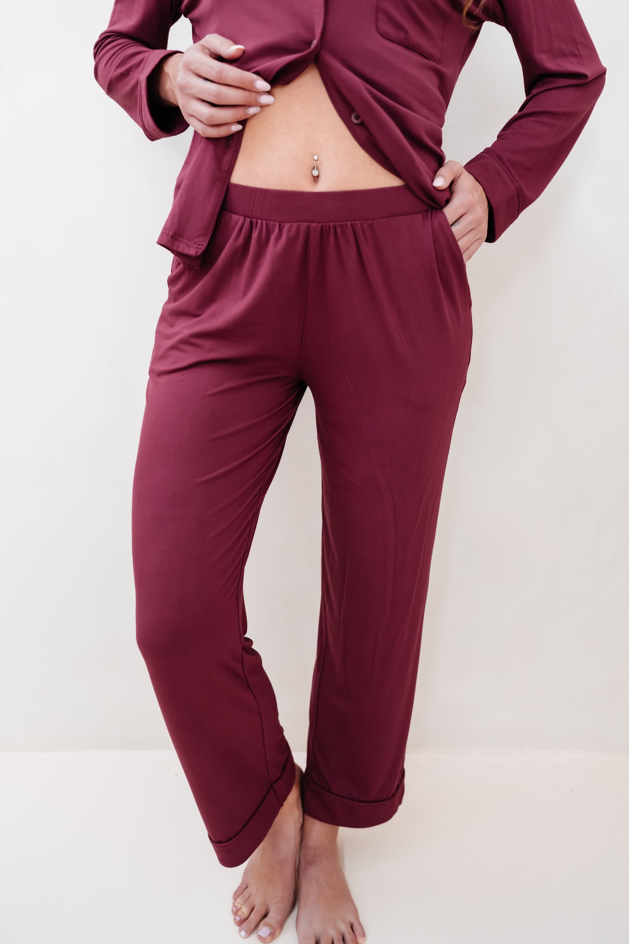 Burgundy pajama set on a plain background
