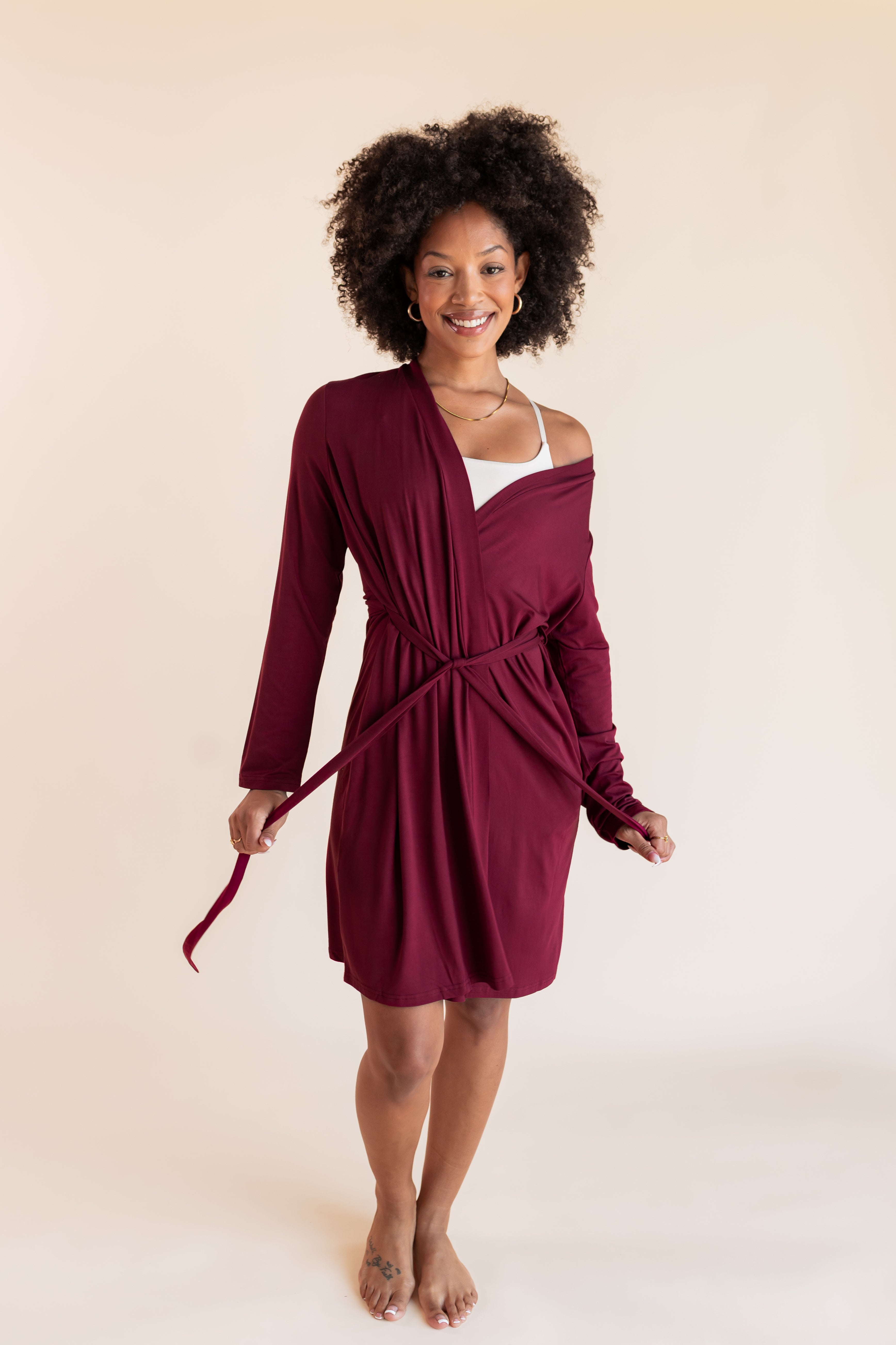 Model wearing Women's Lounge Robe in Burgundy with belt on a beige background
::: Model is 5'9"" wearing size XS/S ///
