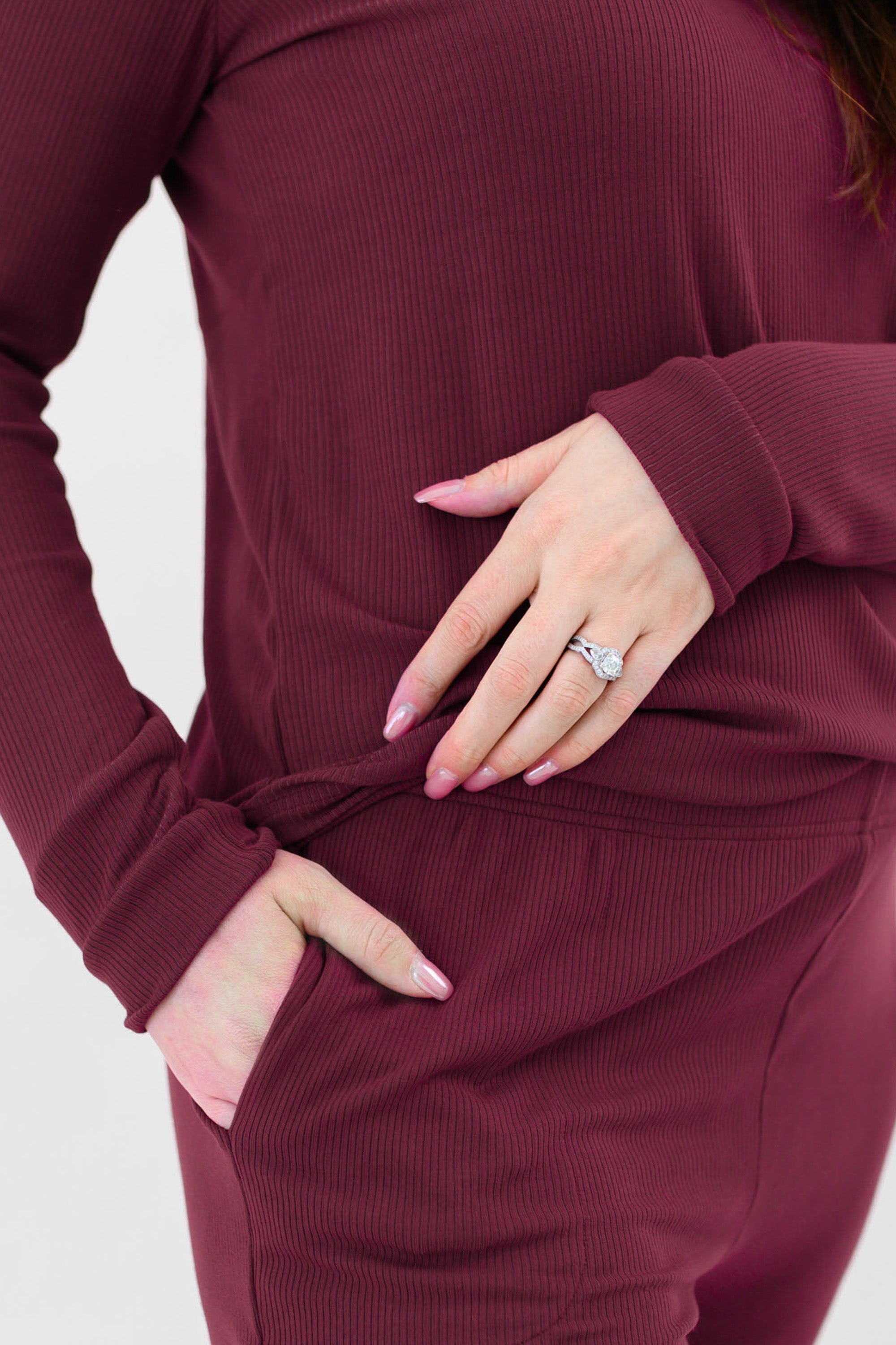 Close up of the pocket and waistband on the pants of the Women’s Ribbed Henley Set in Burgundy