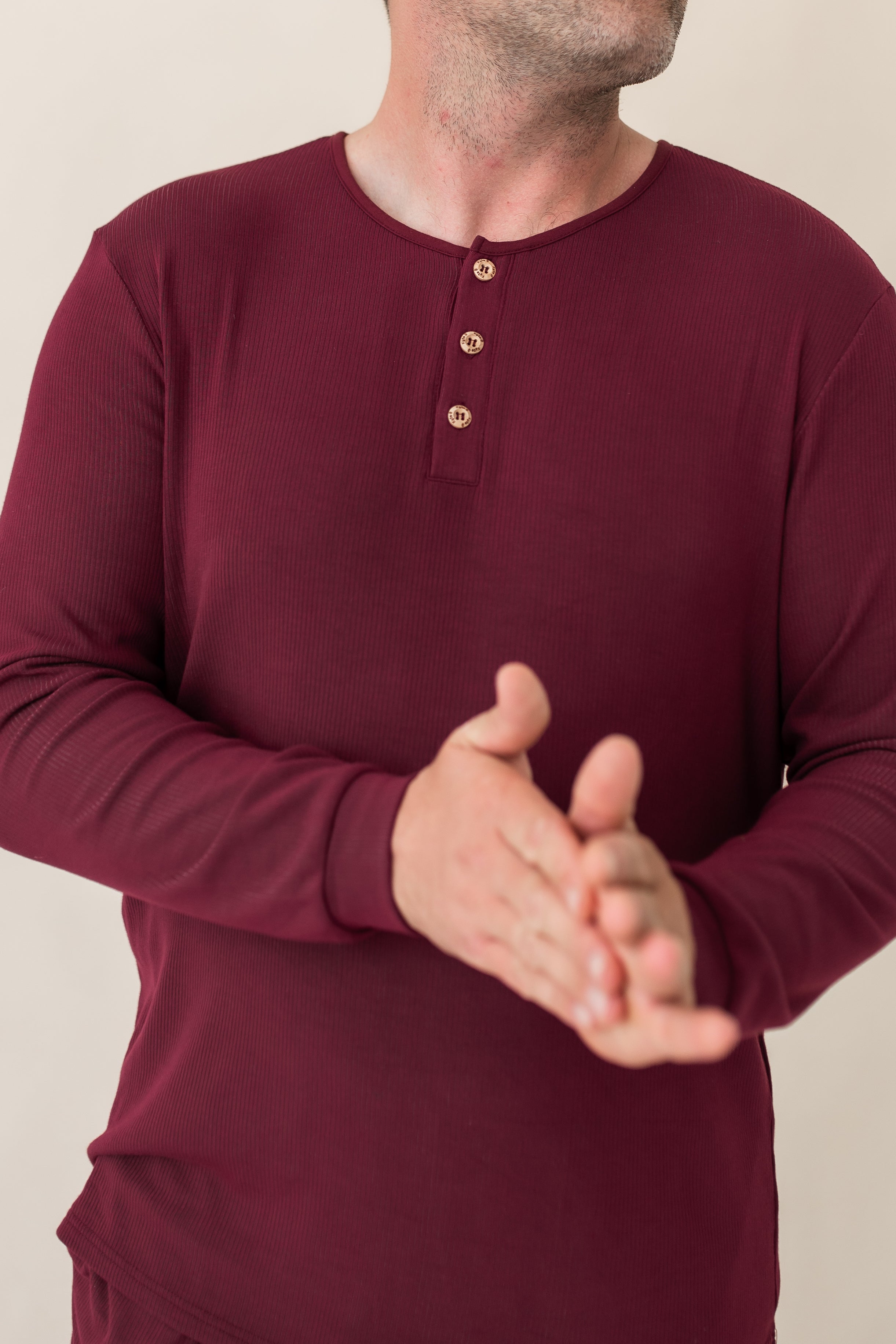 Close up of the Men's Ribbed Henley Top in Burgundy