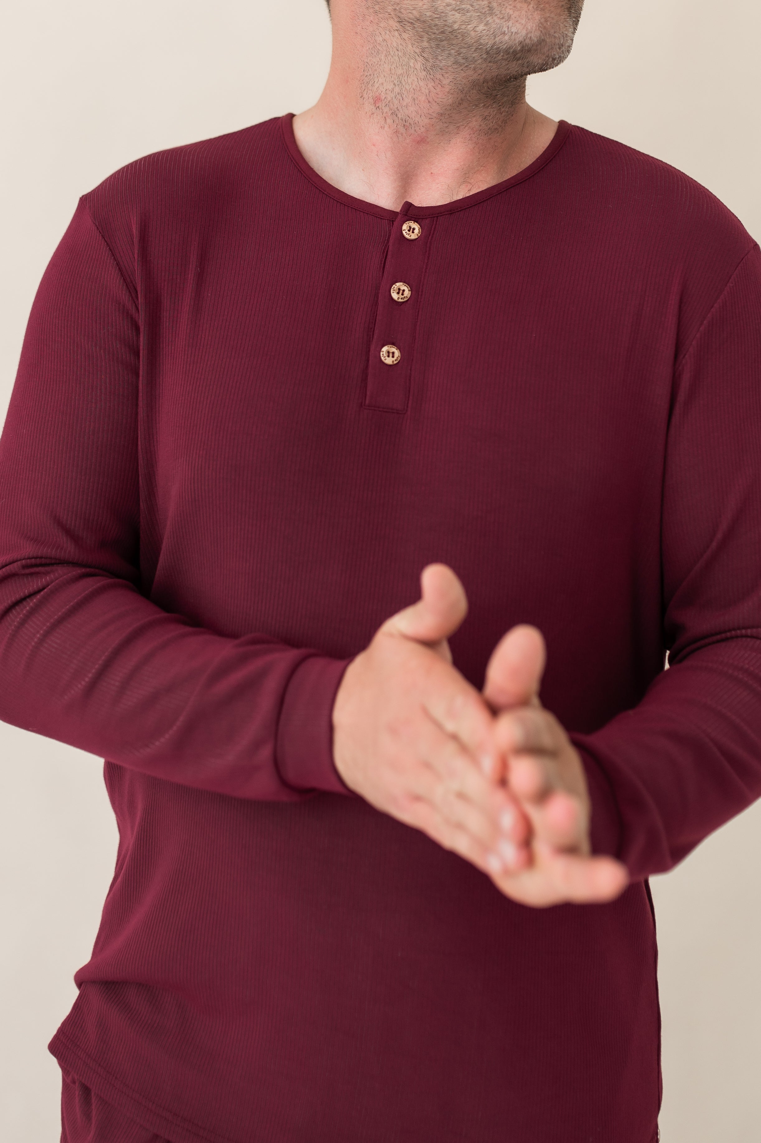 Close up of the Men's Ribbed Henley Top in Burgundy