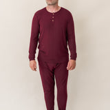 Man modeling the Kyte Men's Ribbed Henley Set in Burgundy