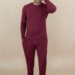 Male model wearing Men's Jogger Set in Burgundy