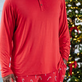 Close up of Men's Long Sleeve Henley Top in Cardinal paired with Lounge Pants in Candy Cane