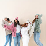 Four Models wearing various colors of the Chunky Knit Women's Oversized Cardigan