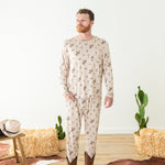 Male model wearing the Men's Jogger Set in Classic Cowboy in front of a western inspired backdrop