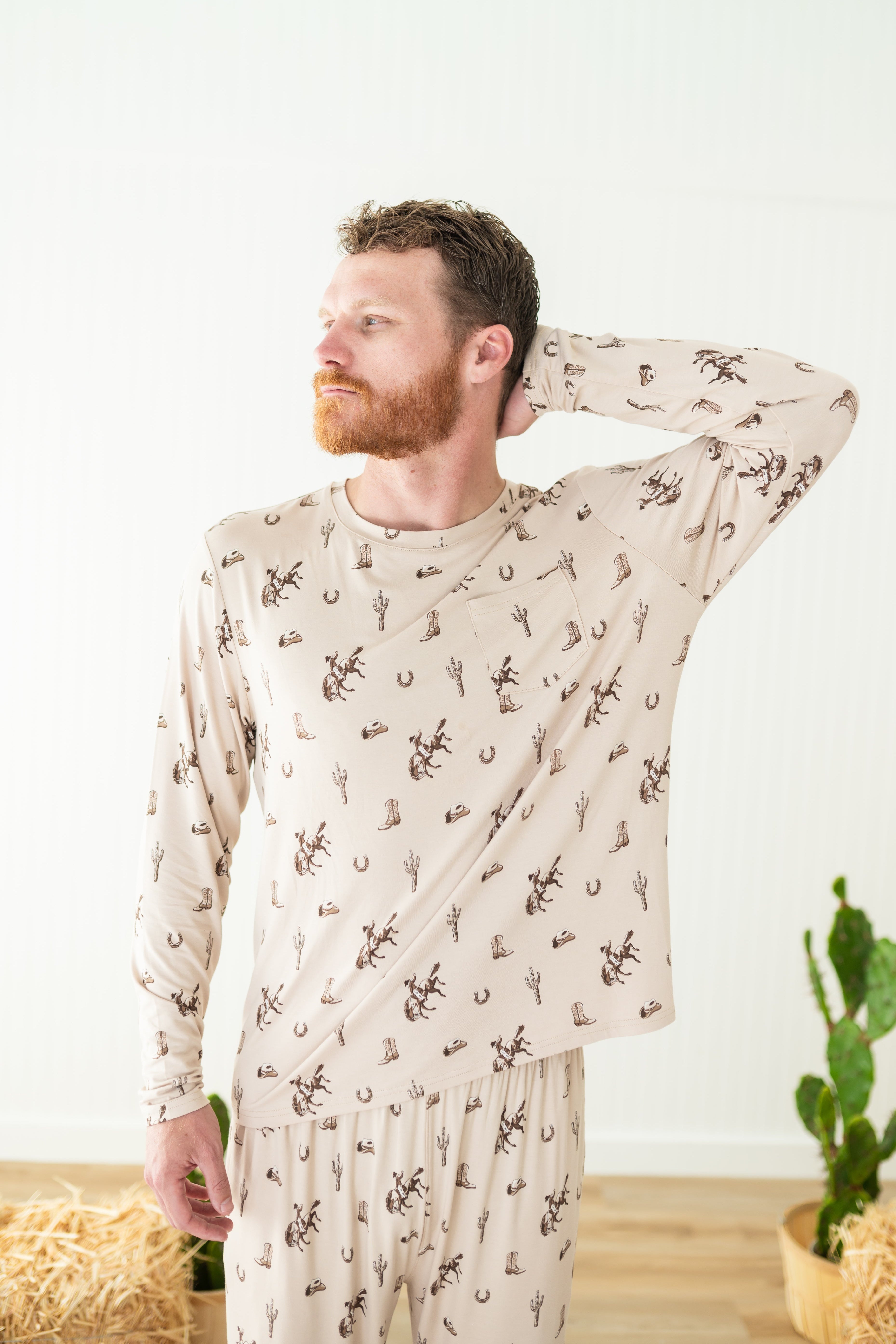 Male modeling the shirt on the Men's Jogger Set in Classic Cowboy with one arm behind his head