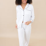 Female Model wearing the Women's Long Sleeve Pajama Set in Snow with Midnight Trim
