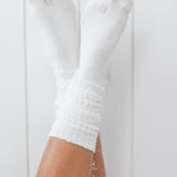 Kyte Scrunch Socks in Cloud shown on a model