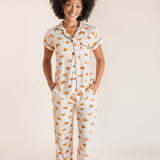 Model wearing Women's Short Sleeve Cropped Pajama Set in Croissant print on a beige background
::: Model is 5'9"" wearing size S ///
