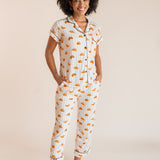 Model posing in Women's Short Sleeve Cropped Pajama Set in Croissant print on a beige background
---PJ 4