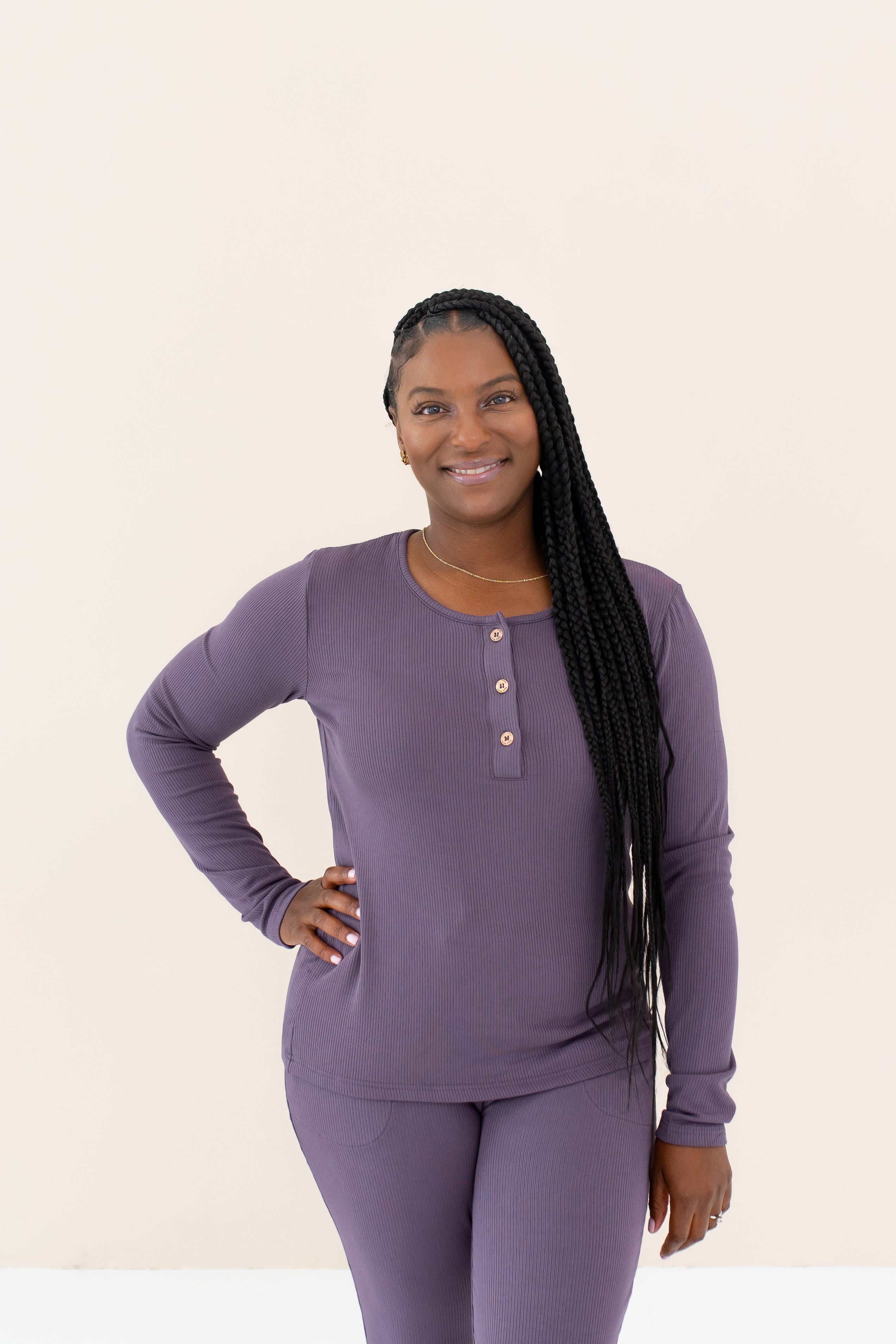 Woman modeling Women's Ribbed Henley Top in Currant