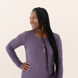 Woman modeling Women's Ribbed Henley Top in Currant looking off to the side