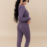 Model showing the backside of the Women's Jogger Pajama Set in Currant