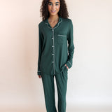 Woman standing with one hand in her pocket wearing long sleeve pajama set in cypress

::: Model is 5'10" wearing size XS Tall ///