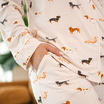 Model showing pockets on Beige Long-Sleeved Women's Pajama Set in Dachshund print

---1605 1
