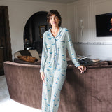 Modal wearing Long-Sleeved Women's Pajama Set in Dew Mahjong print standing against a sofa in a living room
::: Model is 5'10" wearing size XS ///

---PJ 4
