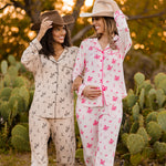  Models in cowboy hats wearing the Long Sleeve Pajama Sets in Classic Cowboy and Disco Cowgirl