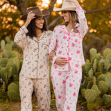  Models in cowboy hats wearing the Long Sleeve Pajama Sets in Classic Cowboy and Disco Cowgirl