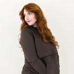 Female modeling the Women's French Terry Nursing Hoodie in Espresso with her hands in the kangaroo pocket