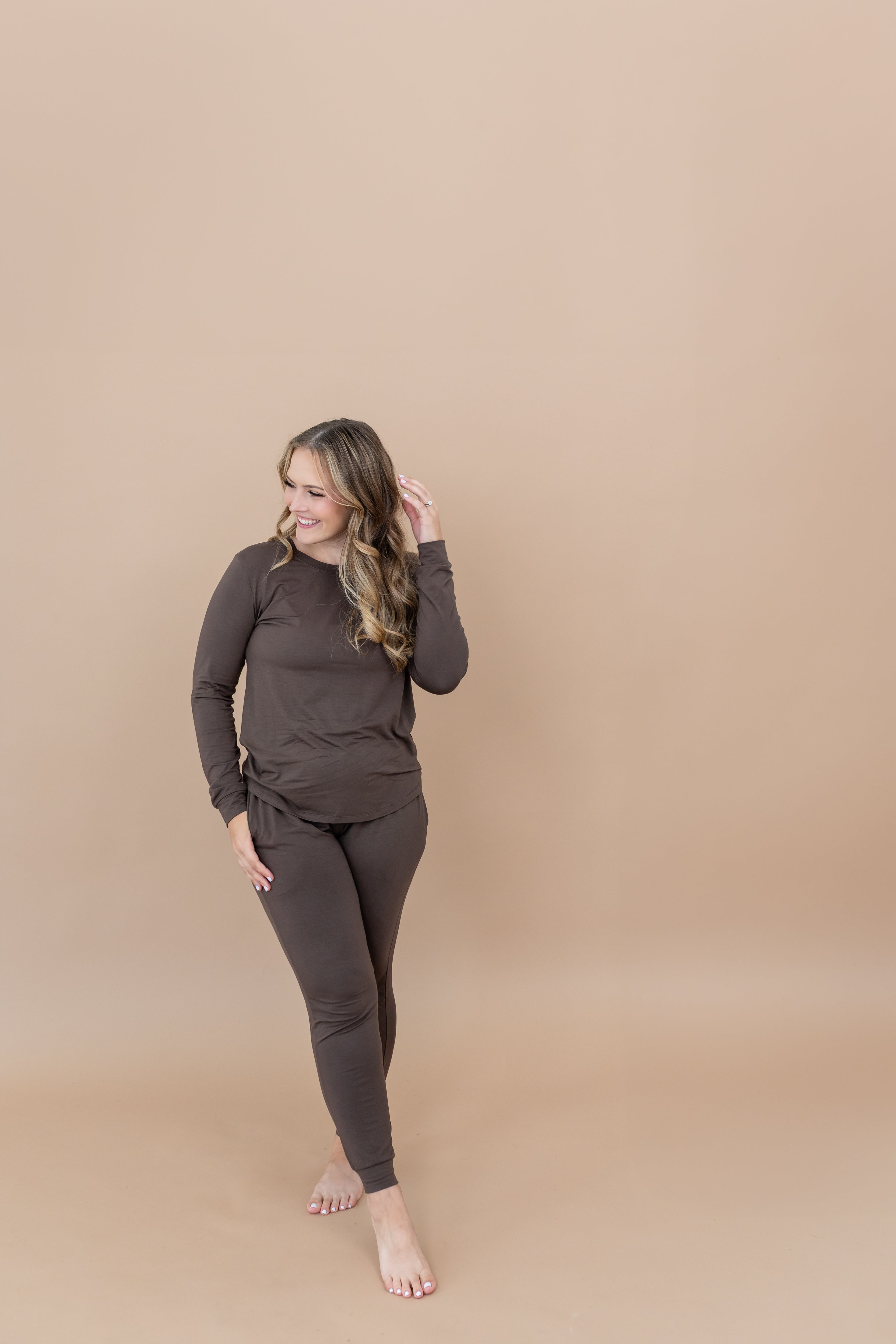 Woman modeling the Kyte Women's Jogger Set in Espresso 