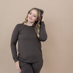 Model with hand in hair while wearing the Women's Jogger Set in Espresso 