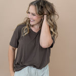 Model with hand in her hair, smiling to the side while wearing the Women's V Neck in Espresso 