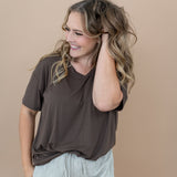 Model with hand in her hair, smiling to the side while wearing the Women's V Neck in Espresso 
