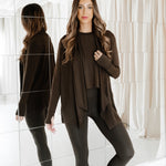 Model standing in front of a mirror wearing the Bamboo Flex Women’s Leggings in Espresso with matching short sleeve tee and matching french terry wrap