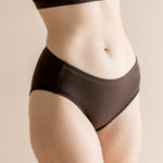 Close up of a model wearing the Women's Underwear in Espresso 

::: Model is wearing size M ///
