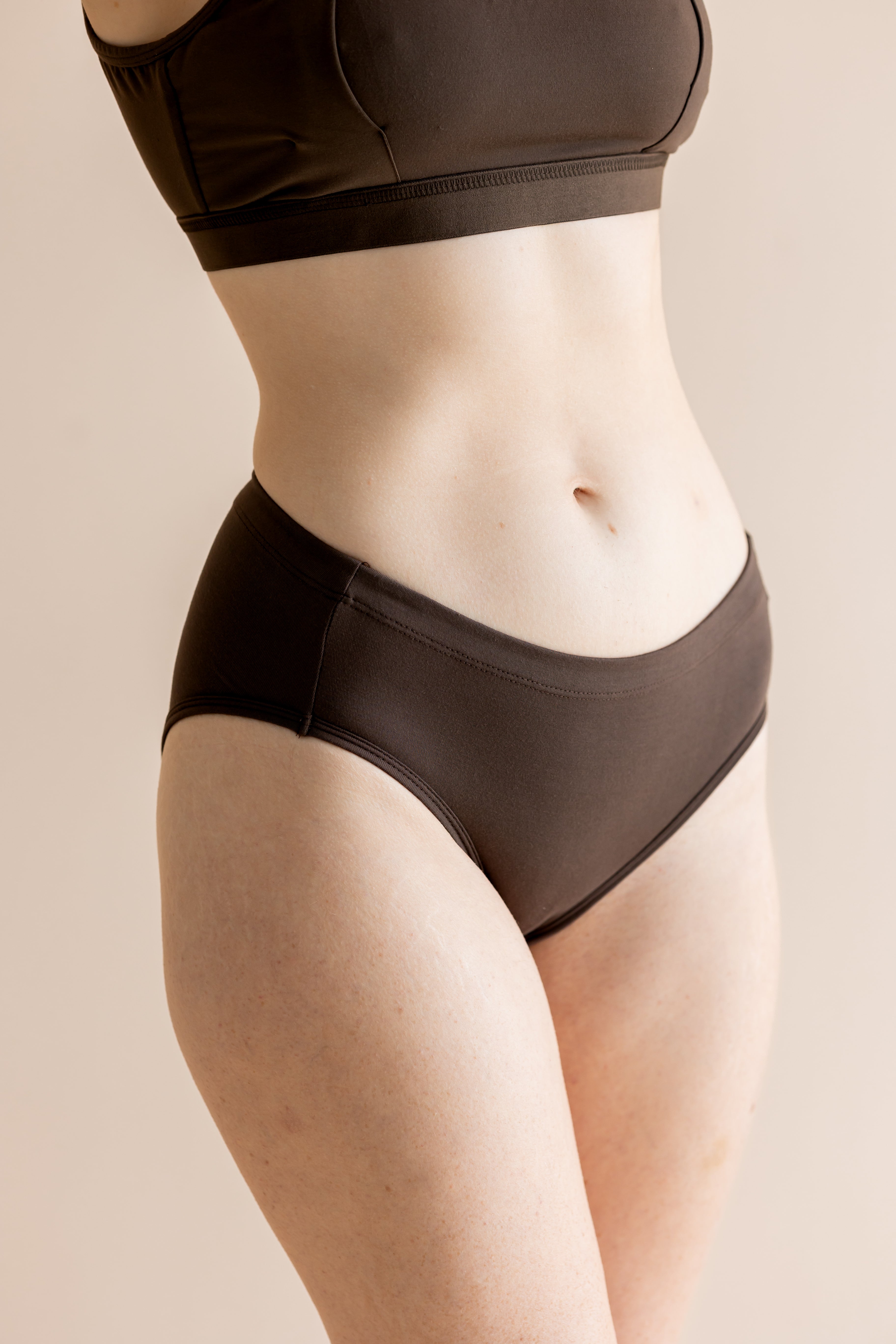 Close up of a model wearing the Women's Underwear in Espresso 

::: Model is wearing size M ///
