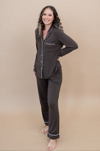 Smiling model with hand on hip while wearing the Long Sleeve Women's Pajama Set in Espresso
