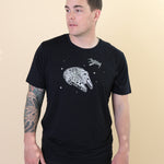 Male modeling the Men's Crew Neck Tee in Millennium Falcon™ with black jeans