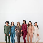 Women modeling the Kyte Women's Jogger Sets in Fir, Atlantic, Espresso, Burgundy, Latte and Bisque