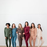 Women modeling the Kyte Women's Jogger Sets in Fir, Atlantic, Espresso, Burgundy, Latte and Bisque