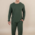 Smiling male model wearing Kyte Men's Jogger Set in Fir