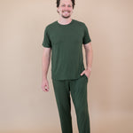 Male model wearing the Kyte Men's Lounge Pants in Fir