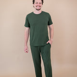 Male model wearing the Kyte Men's Lounge Pants in Fir