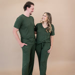 Couple wearing matching sets in Fir
