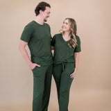 Couple wearing matching sets in Fir